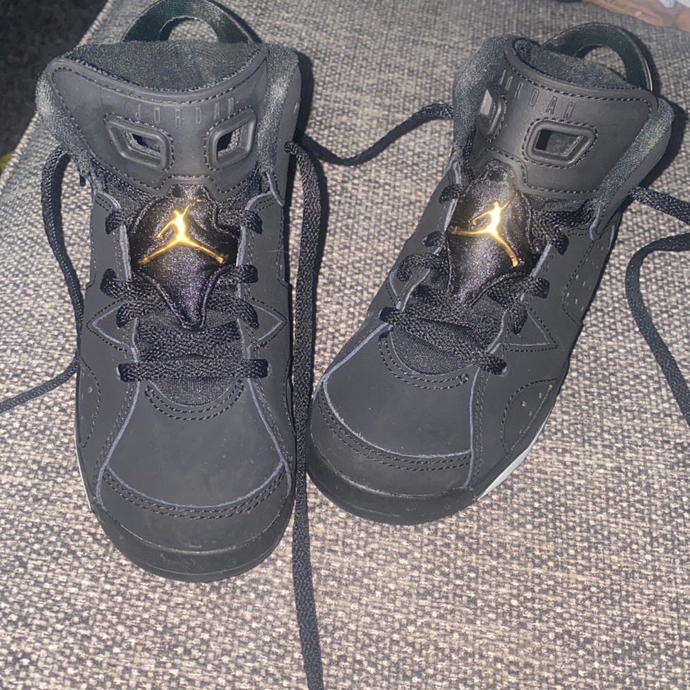 Black/gold/white Jordan’s
